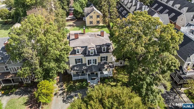 an aerial view of a house with a garden