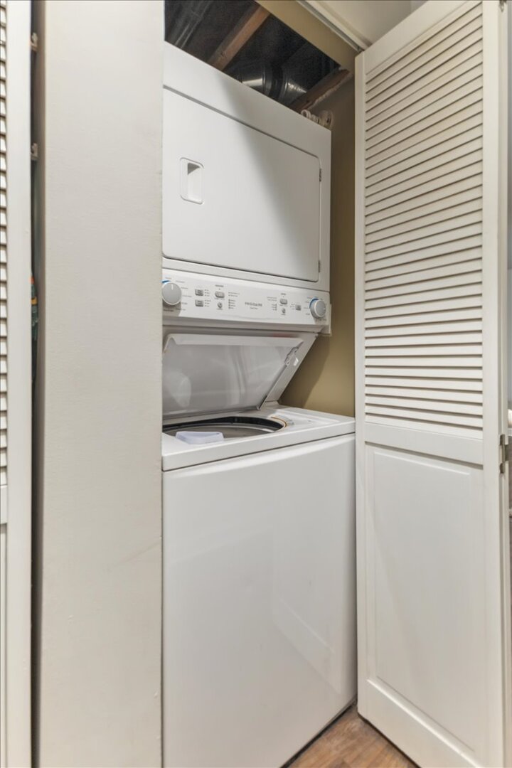 1111 North Honore Street, Unit 1 Chicago, IL 60622 - Photo 14 of 16 a close up view of a washer and dryer