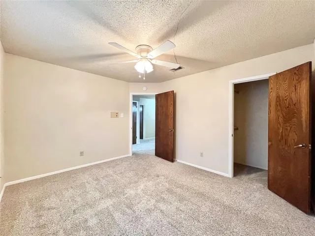 a view of a backyard with garden