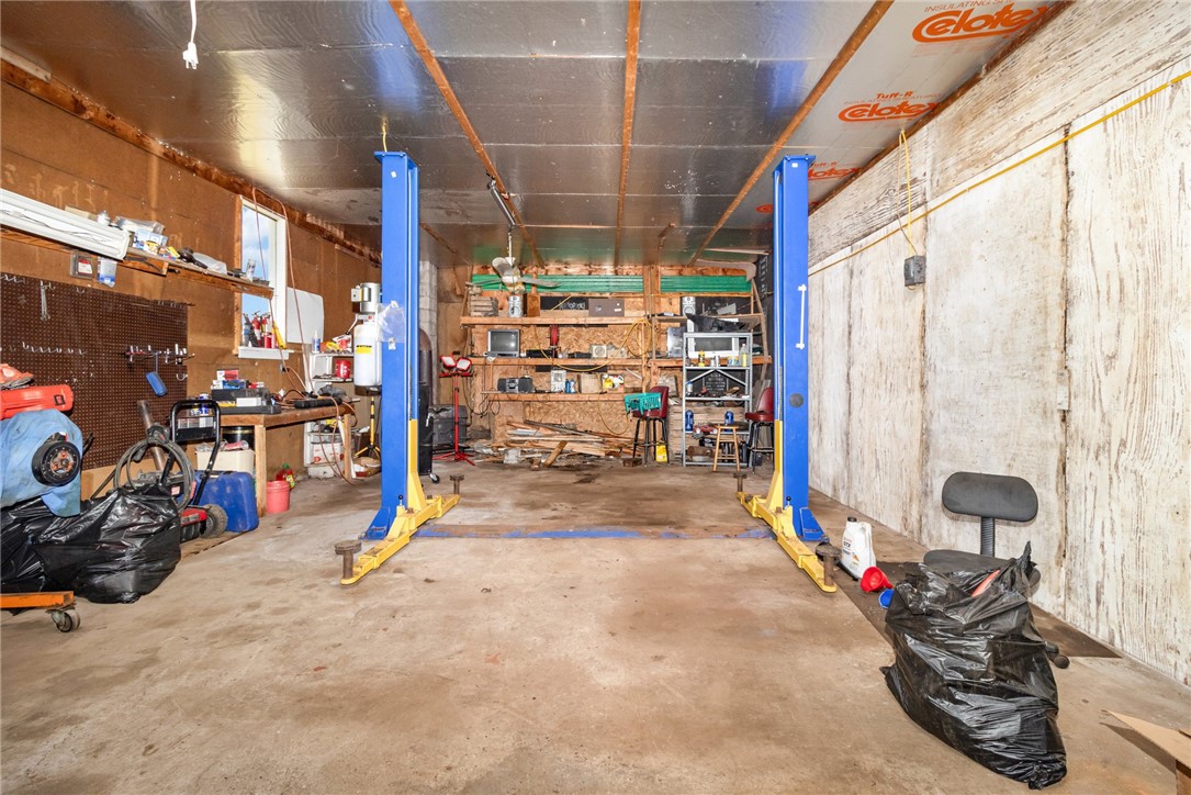 4480 Pilgrimport Road Sodus, NY 14489 - Photo 16 of 27 CAR LIFT inside garage!