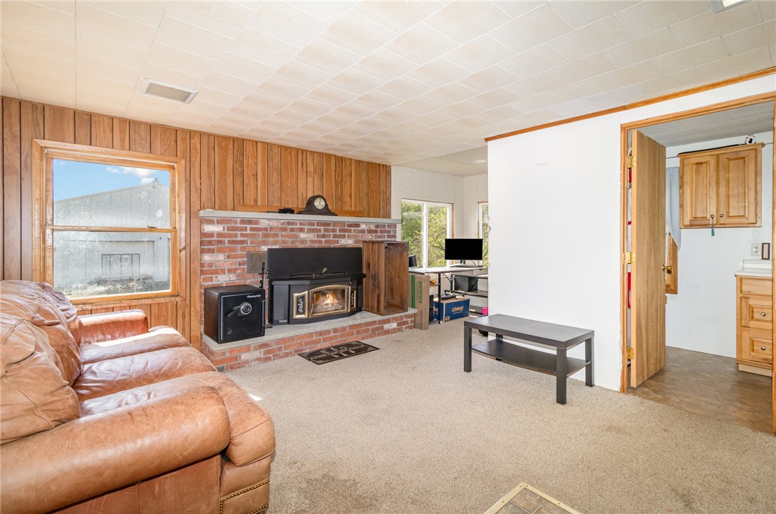 4480 Pilgrimport Road Sodus, NY 14489 - Photo 2 of 27 Family Room with fireplace. Powder Room off family