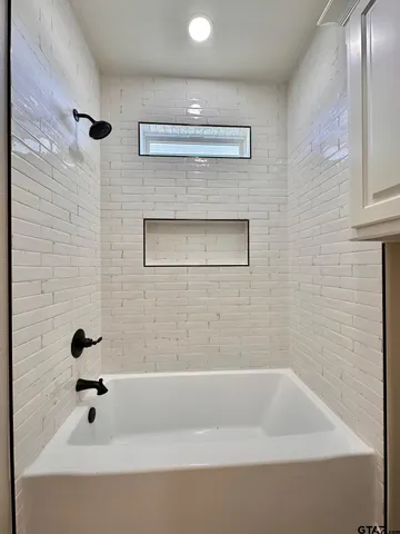 a bathroom with a bathtub
