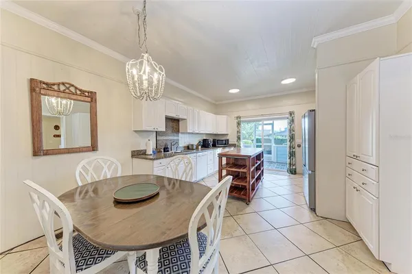 a bedroom with a large bed and a couch