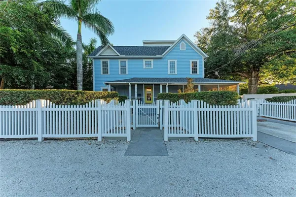a outdoor living space with furniture and a large window