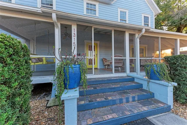 an aerial view of a houses with outdoor space