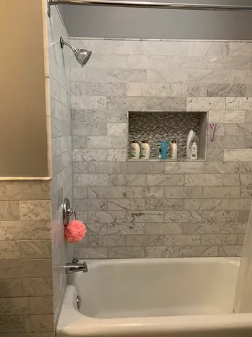 a bathroom with a sink and a tub