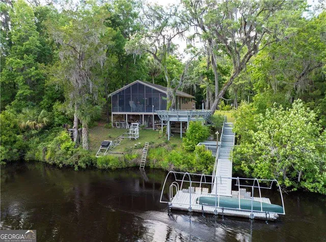 a house view with a lake view