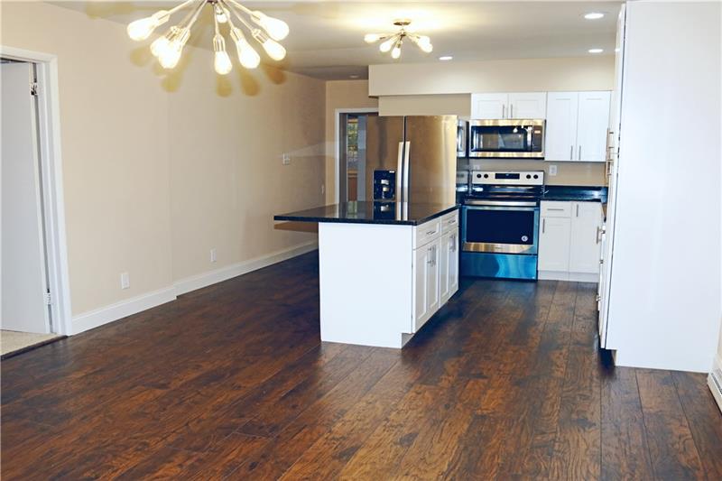 1241 Eckert Road Monaca, PA 15061 - Photo 3 of 15 Renovated Kitchen, New flooring, New Granite, New Stainless Appliances, New Cabinets, New Lighting