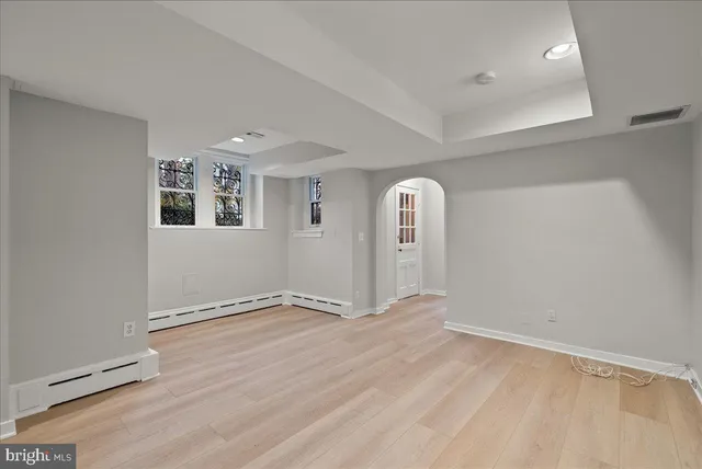 an empty room with windows