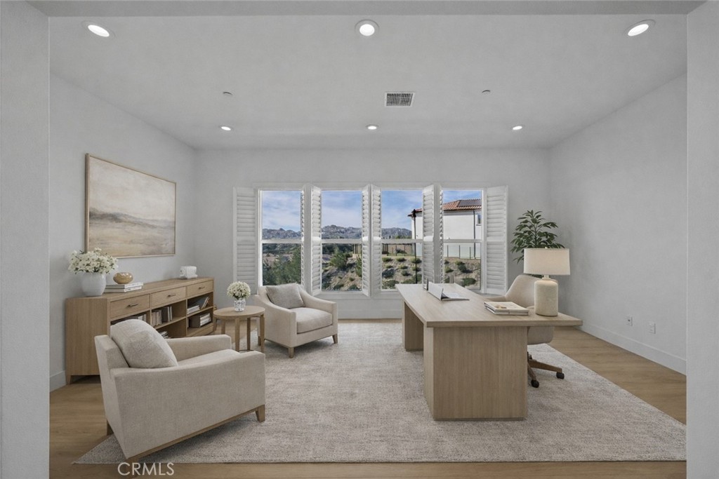 20638 Deer Grass Court Porter Ranch, CA 91326 - Photo 8 of 50 a living room with furniture and a table