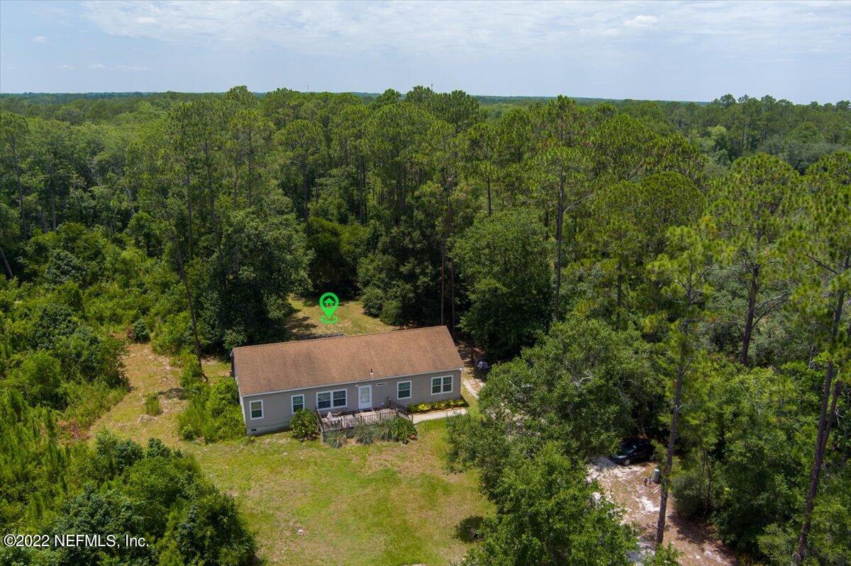 101 Sand Lake Road Interlachen, FL 32148 - Photo 19 of 40 an aerial view of a house with pool outdoor seating and yard