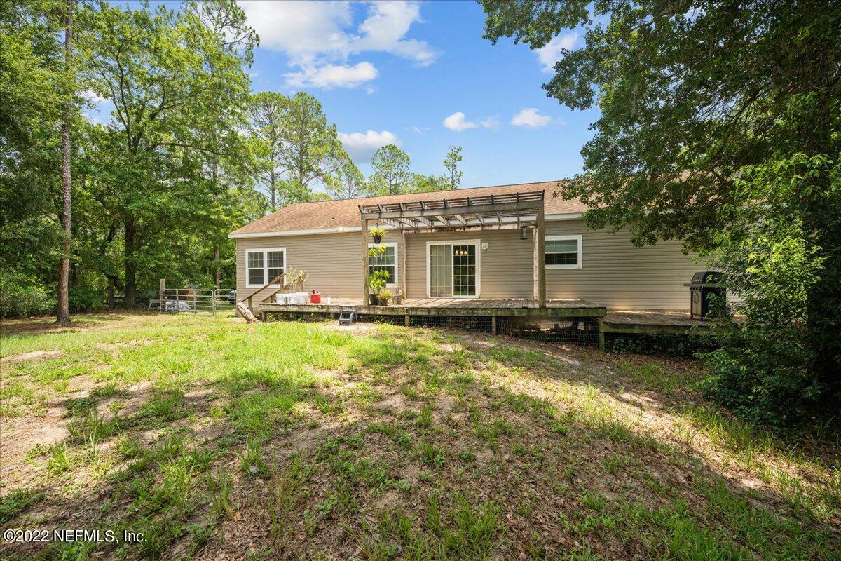 101 Sand Lake Road Interlachen, FL 32148 - Photo 26 of 40 a house view with a swimming pool