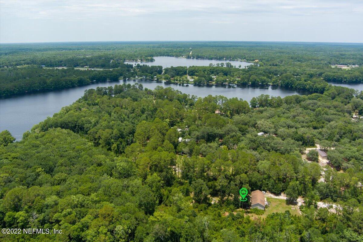 101 Sand Lake Road Interlachen, FL 32148 - Photo 35 of 40 an aerial view of residential houses with outdoor space and trees