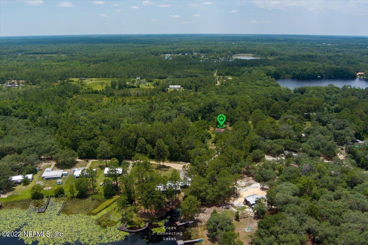 101 Sand Lake Road Interlachen, FL 32148 - Photo 40 of 40 an aerial view of residential houses with outdoor space and trees