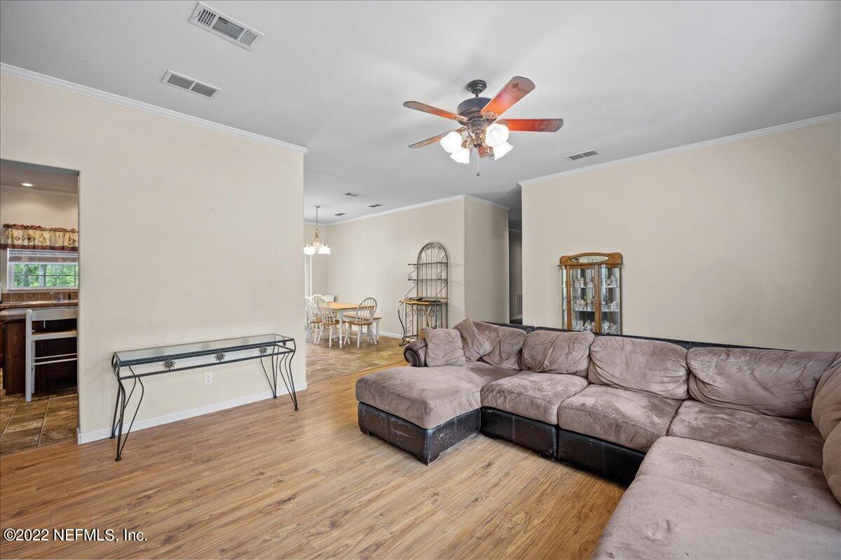101 Sand Lake Road Interlachen, FL 32148 - Photo 7 of 40 a living room with furniture