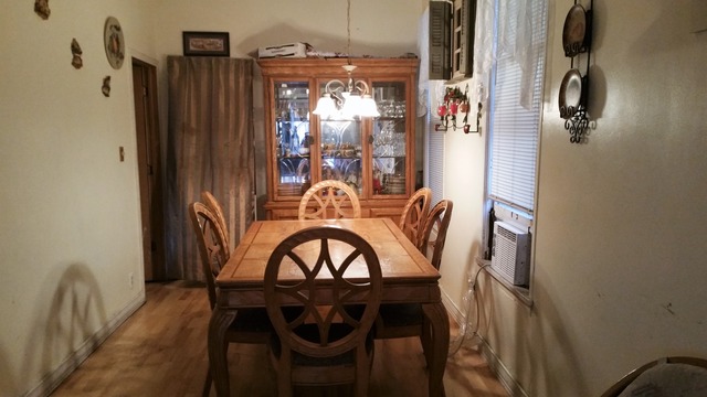 2441 West Haddon Avenue Chicago, IL 60622 - Photo 3 of 10 a view of a dining room with furniture and chandelier