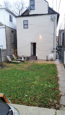 2441 West Haddon Avenue Chicago, IL 60622 - Photo 10 of 10 a front view of house with yard
