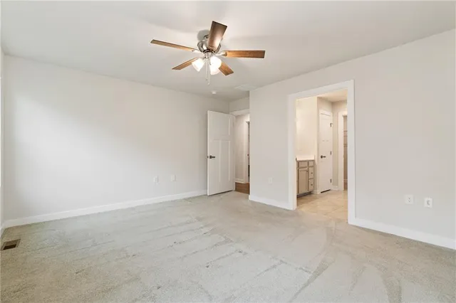 a bathroom with a double vanity sink mirror and