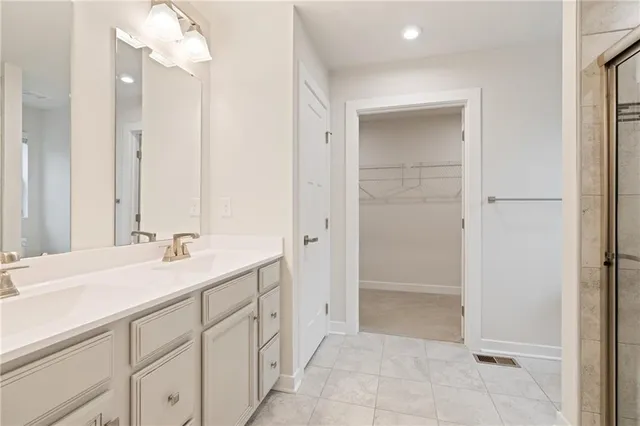 a bathroom with a shower and toilet