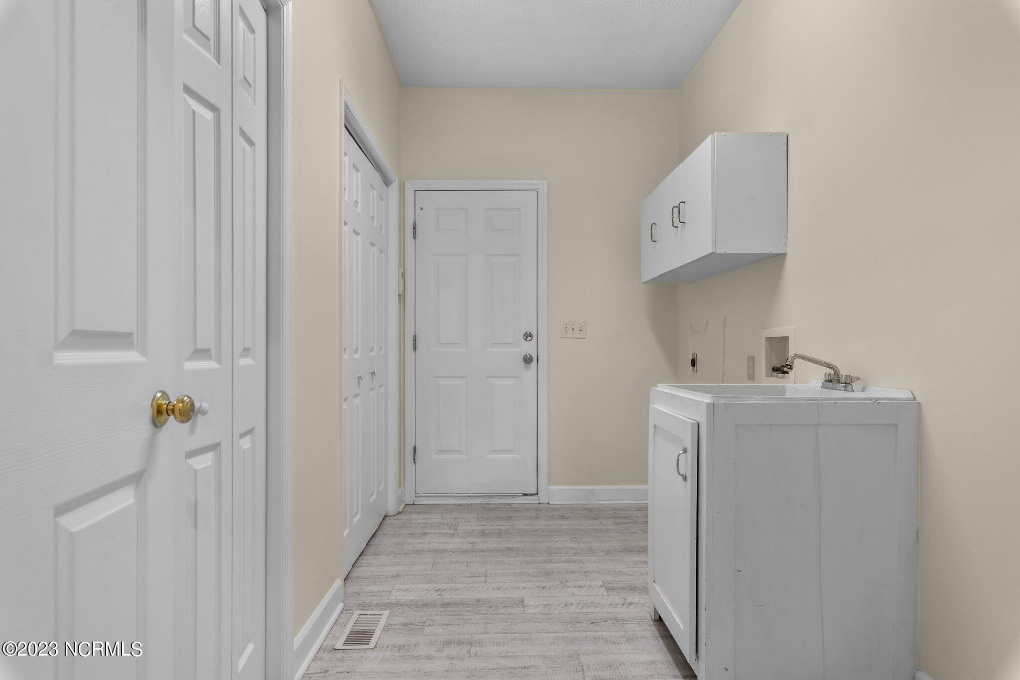 65 McQueen Road Pinehurst, NC 28374 - Photo 29 of 31 Laundry Room