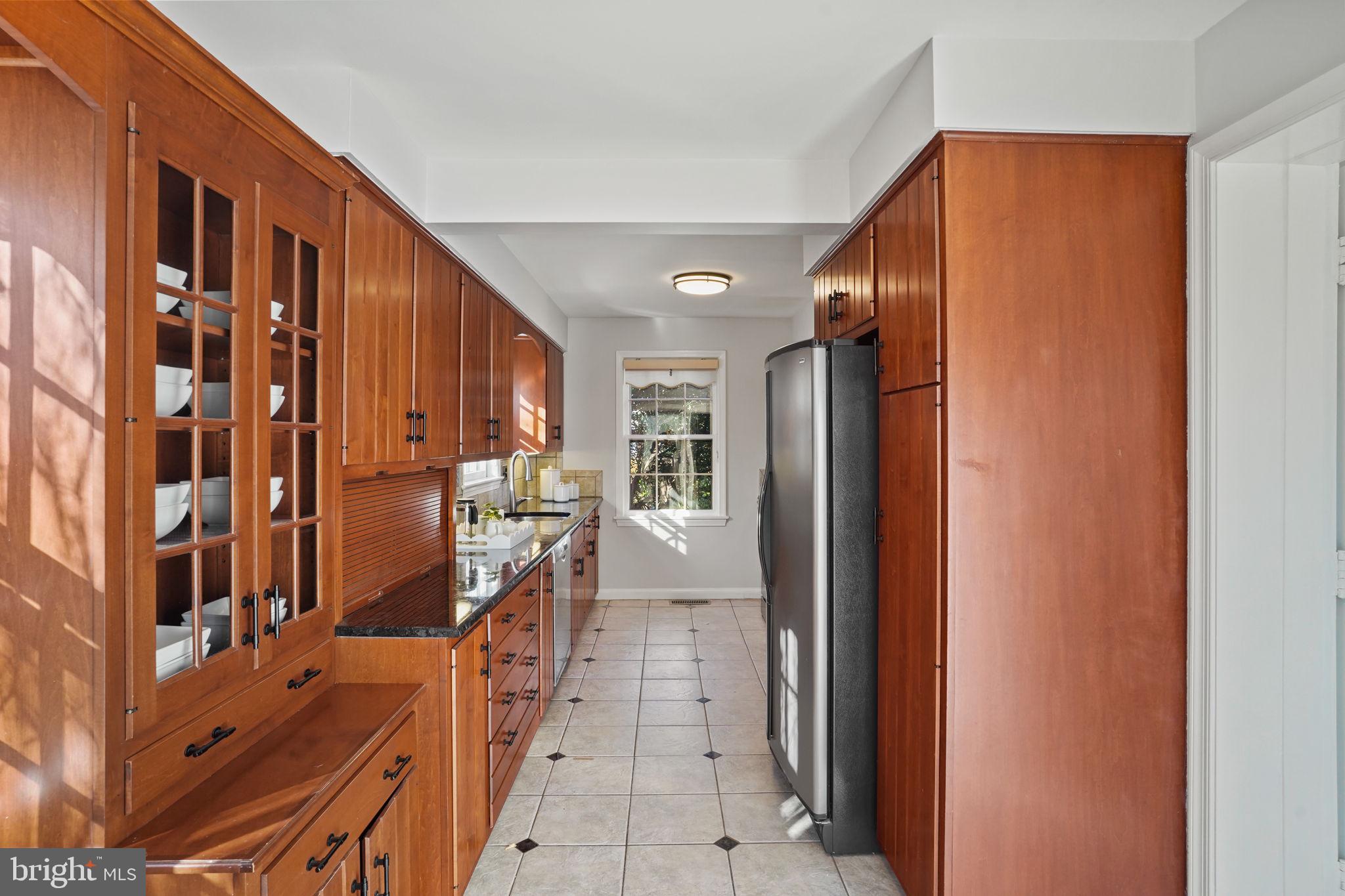 406 West Braddock Road Alexandria, VA 22302 - Photo 14 of 56 Natural wood cabinets with new hardware