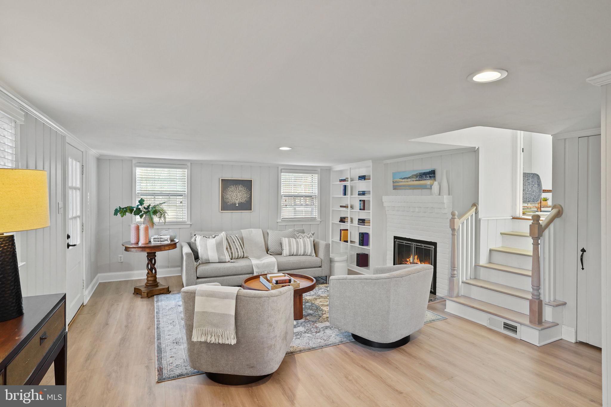 406 West Braddock Road Alexandria, VA 22302 - Photo 16 of 56 a living room with furniture and a wooden floor