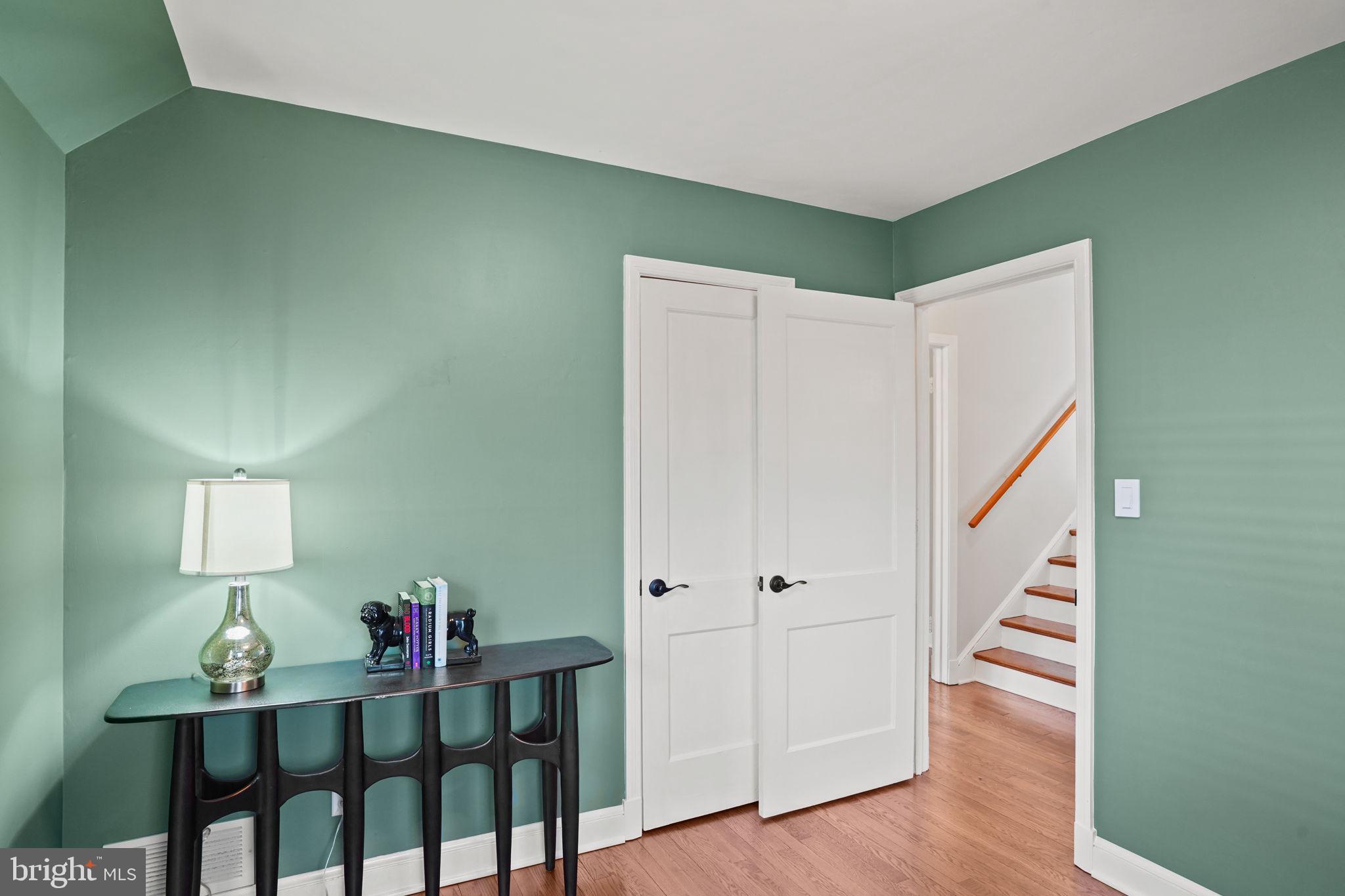 406 West Braddock Road Alexandria, VA 22302 - Photo 23 of 56 a view of entryway with stairs and wooden floor