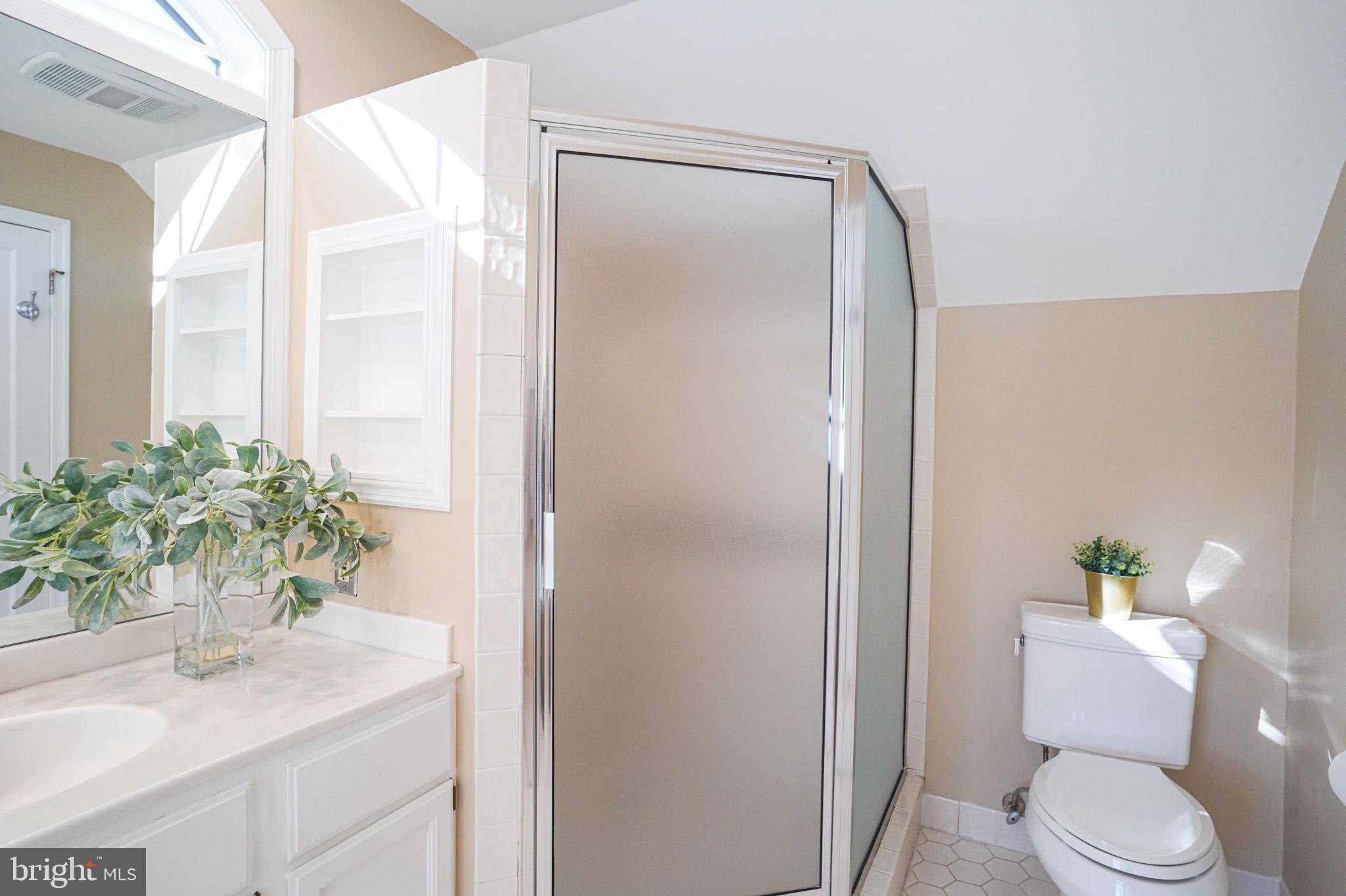 406 West Braddock Road Alexandria, VA 22302 - Photo 31 of 56 a bathroom with a sink toilet and shower