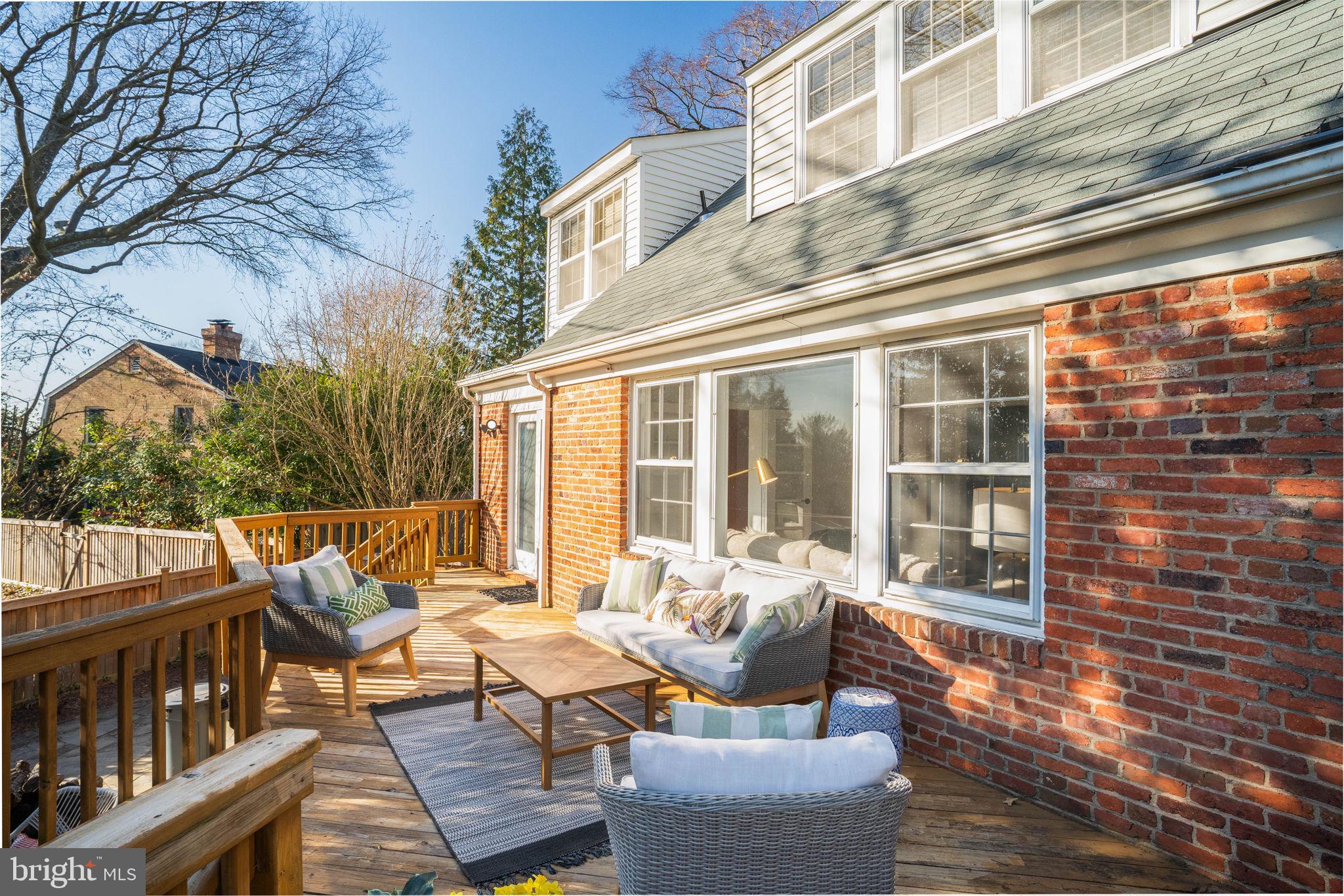 406 West Braddock Road Alexandria, VA 22302 - Photo 32 of 56 a view of a patio with couches chairs and wooden floor