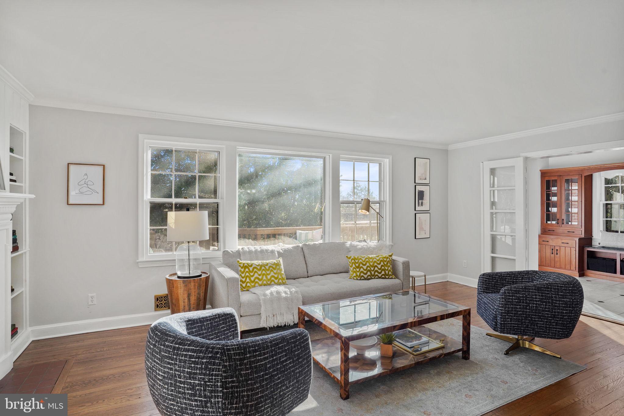 406 West Braddock Road Alexandria, VA 22302 - Photo 6 of 56 a living room with furniture a rug and a window