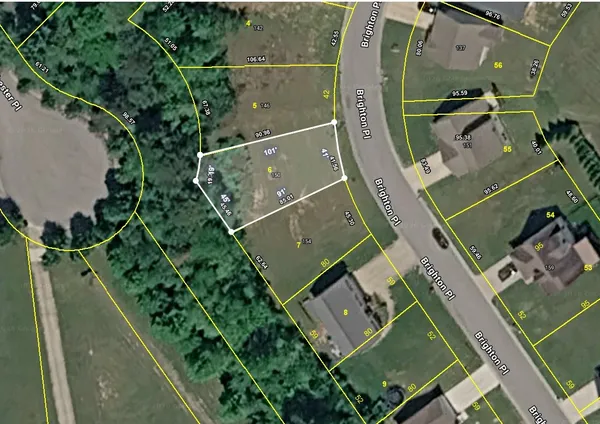 an aerial view of a residential houses with outdoor space