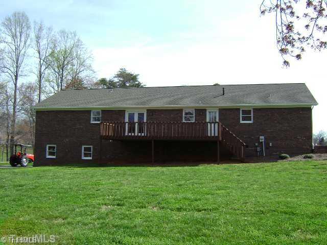 823 Community Road Lexington, NC 27295 - Photo 13 of 16 Exterior Front. Back of house with relaxing deck.