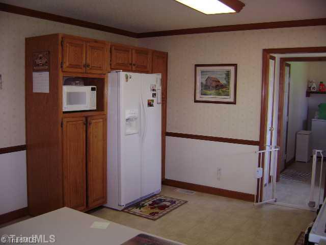 823 Community Road Lexington, NC 27295 - Photo 5 of 16 Exterior Front. Kitchen with pantry.