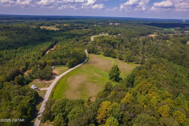 a view of a lake in middle of the town