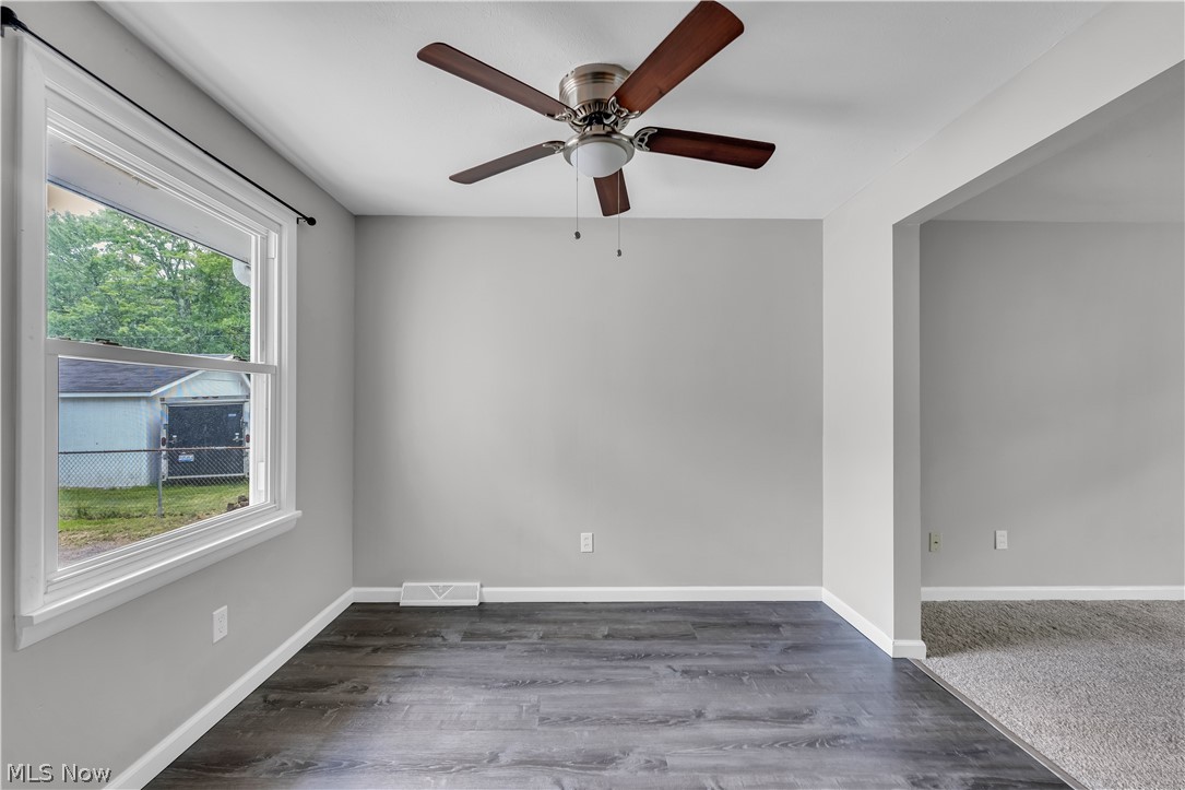 8043 Munson Road Mentor, OH 44060 - Photo 10 of 27 Unfurnished room with ceiling fan and dark carpet