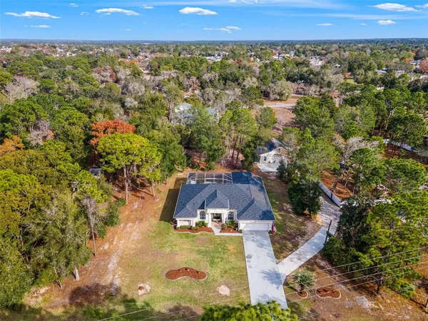 $699,999 | 14071 Linden Drive, Spring Hill, FL 34609