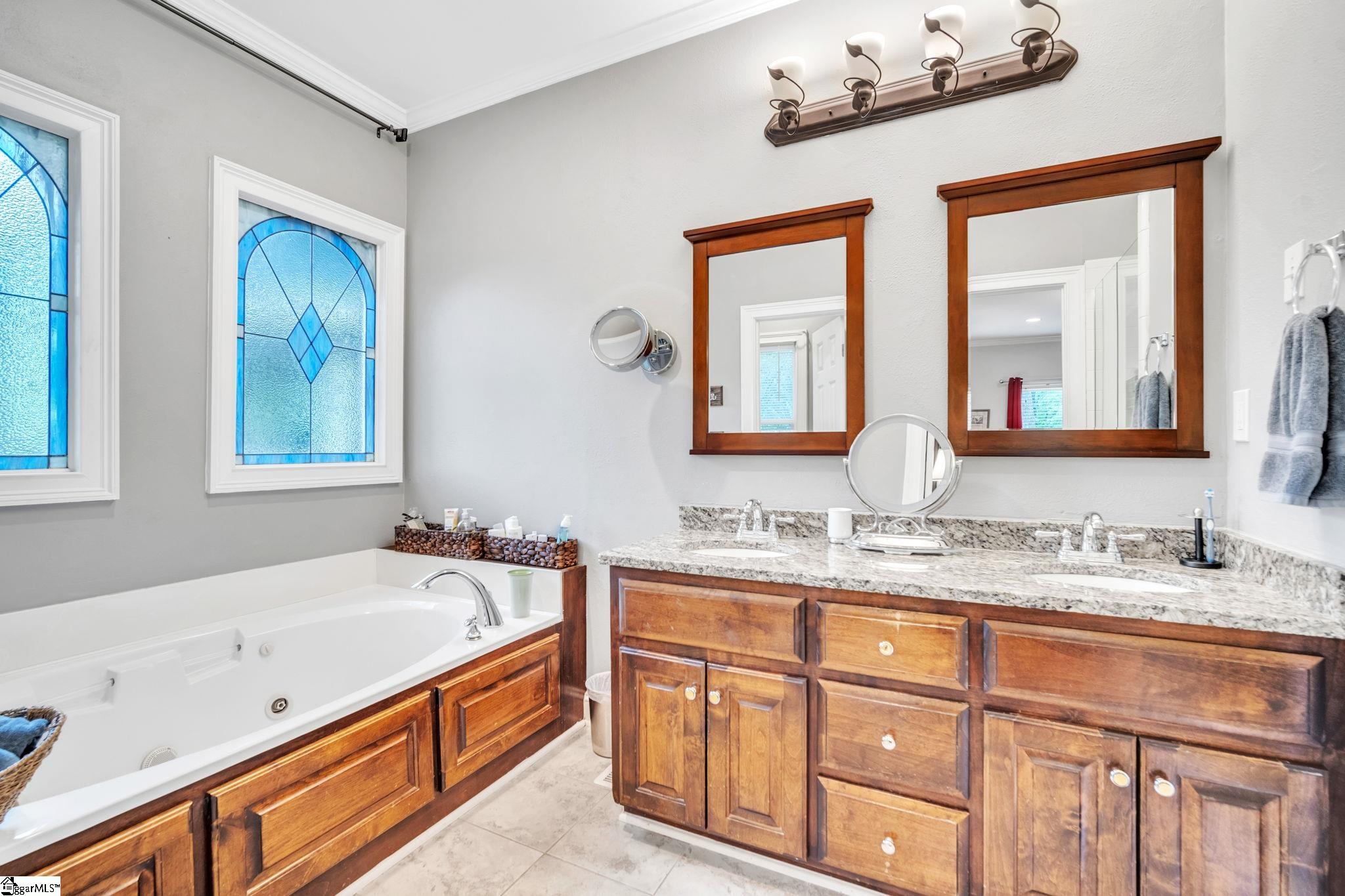 204 Deer Spring Lane Simpsonville, SC 29680 - Photo 11 of 36 Double sinks, water closet, jetted tub + walk-in shower.