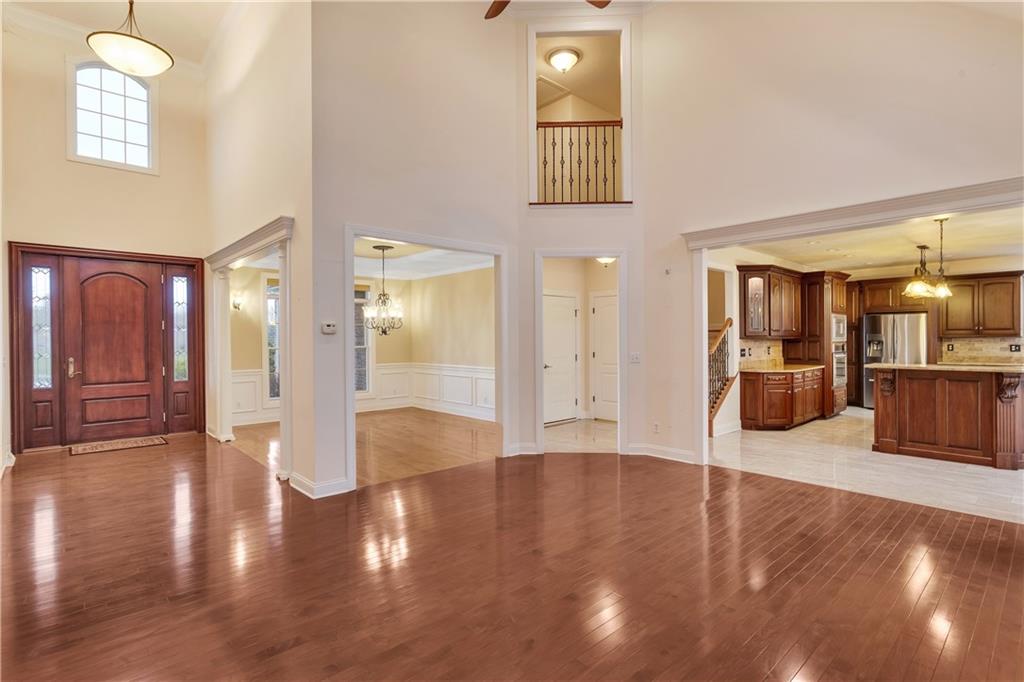 116 James Drive Beaver, PA 15009 - Photo 11 of 44 an empty room with wooden floor and windows