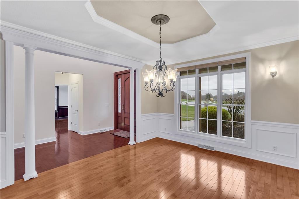 116 James Drive Beaver, PA 15009 - Photo 5 of 44 a view of livingroom with chandelier and wooden floor