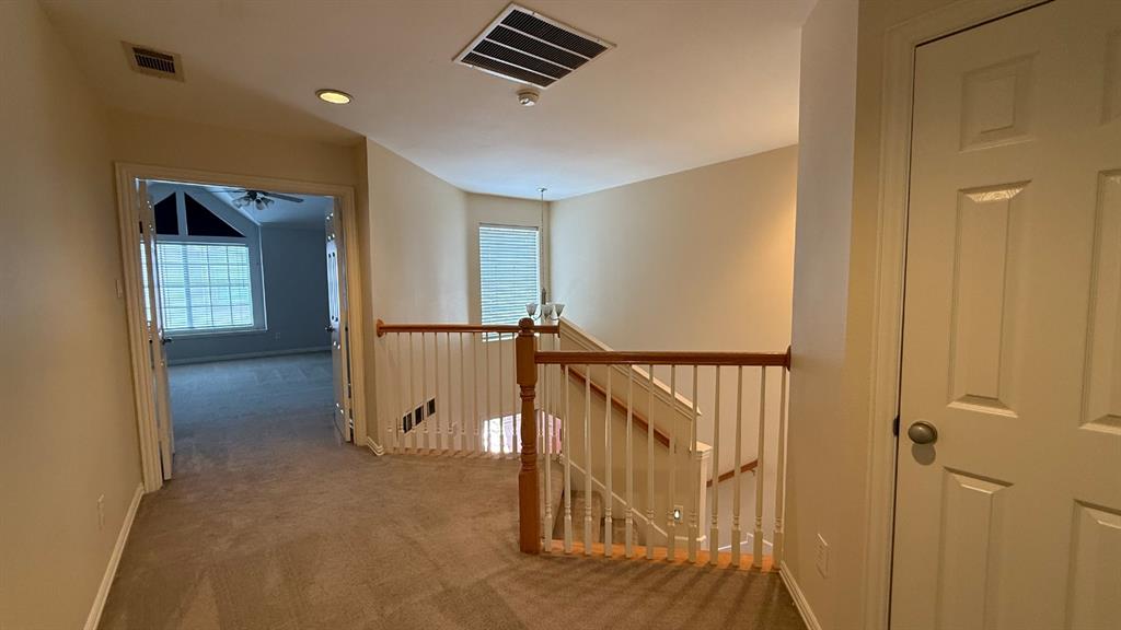18240 Midway Road, Unit 1204 Dallas, TX 75287 - Photo 10 of 27 a view of a hallway with entryway