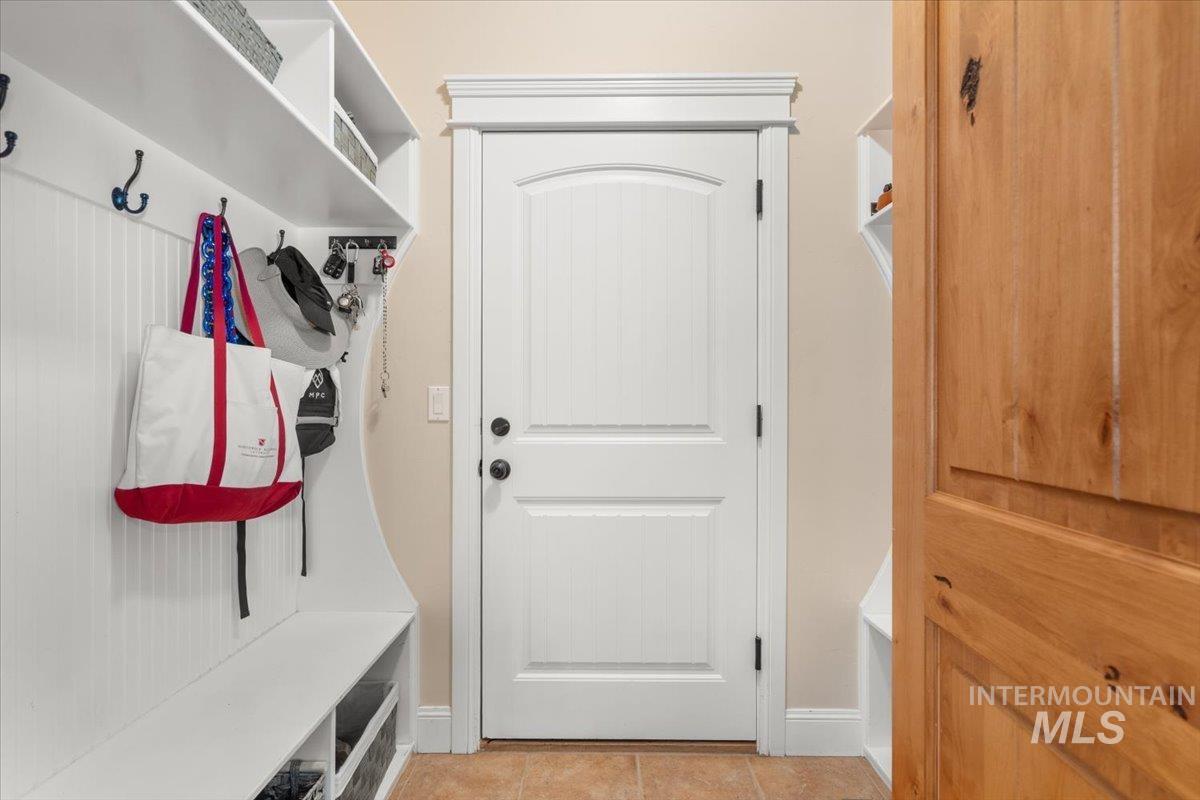 4154 North Tipton Avenue Meridian, ID 83646 - Photo 20 of 50 White interior door with arched paneling and black hardware