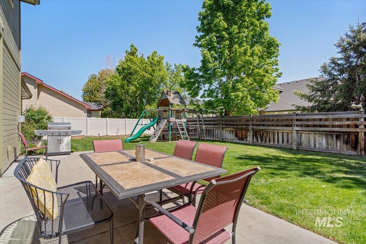 4154 North Tipton Avenue Meridian, ID 83646 - Photo 45 of 50 Expansive concrete patio offering ample space for outdoor dining