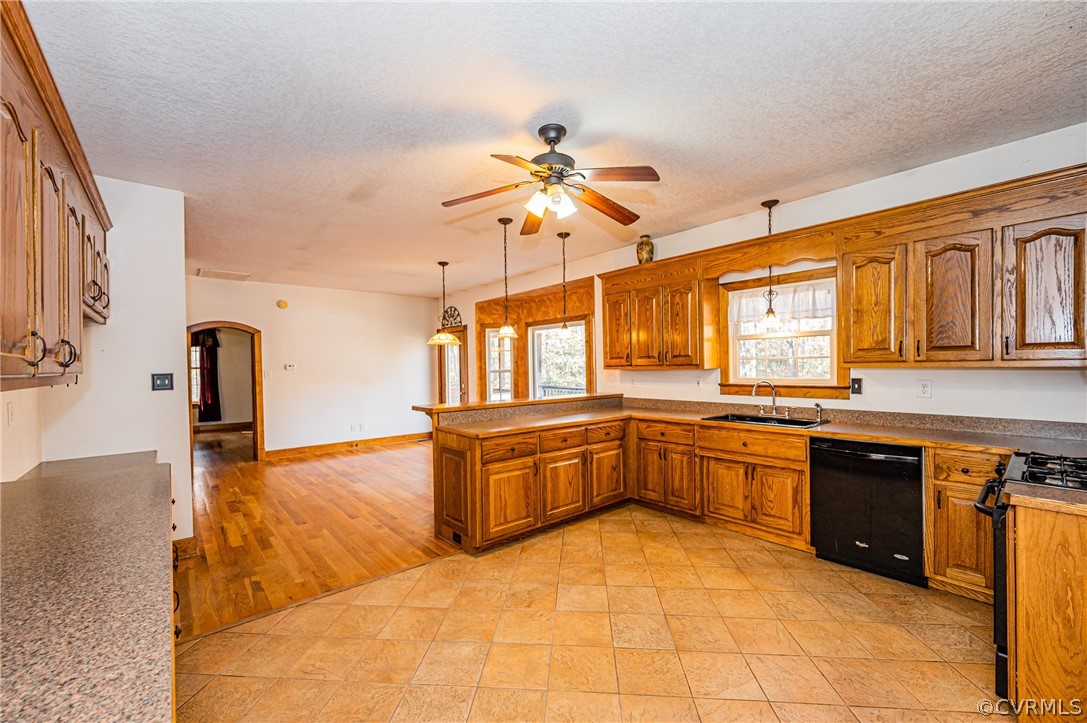 4612 Tatum Road Disputanta, VA 23842 - Photo 11 of 50 a large kitchen with stainless steel appliances granite countertop a sink and counter space