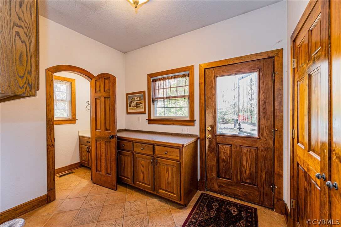 4612 Tatum Road Disputanta, VA 23842 - Photo 16 of 50 a view of an entryway with a window