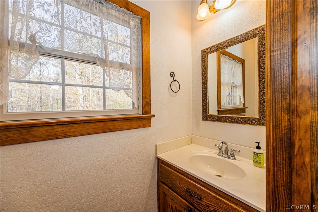 4612 Tatum Road Disputanta, VA 23842 - Photo 19 of 50 a bathroom with a sink and a bathtub