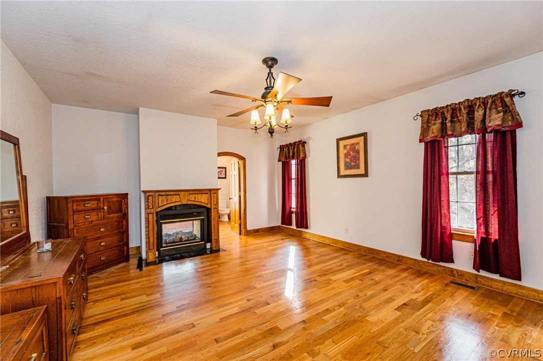 4612 Tatum Road Disputanta, VA 23842 - Photo 22 of 50 a living room with furniture and a fireplace