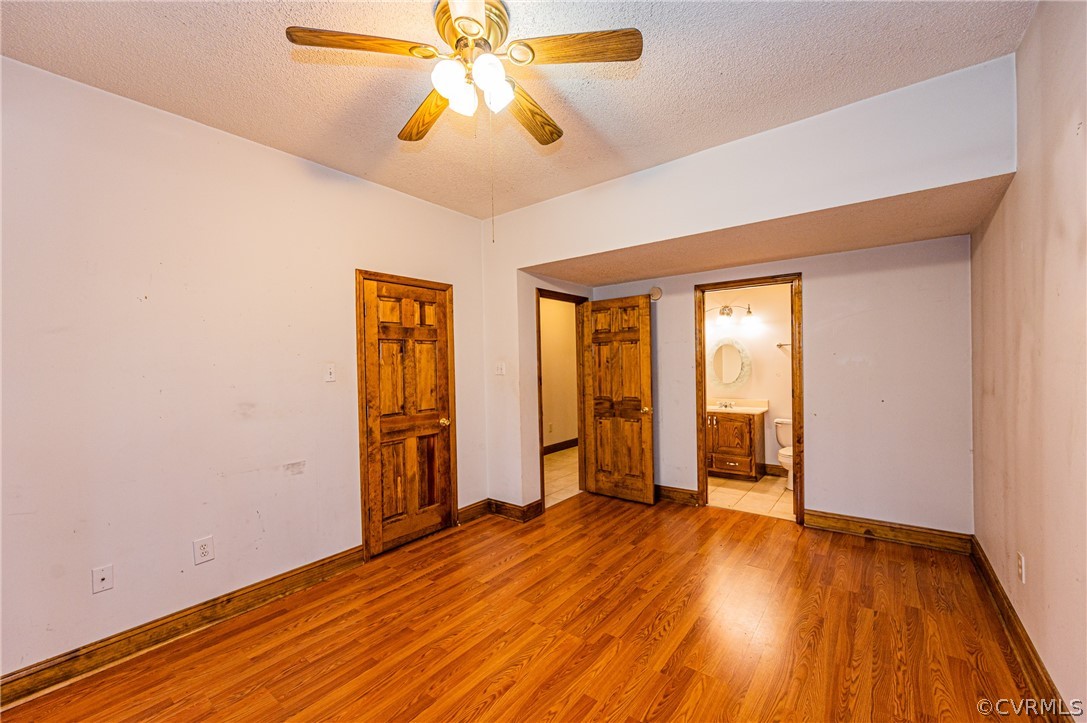 4612 Tatum Road Disputanta, VA 23842 - Photo 31 of 50 wooden floor in an empty room with a window