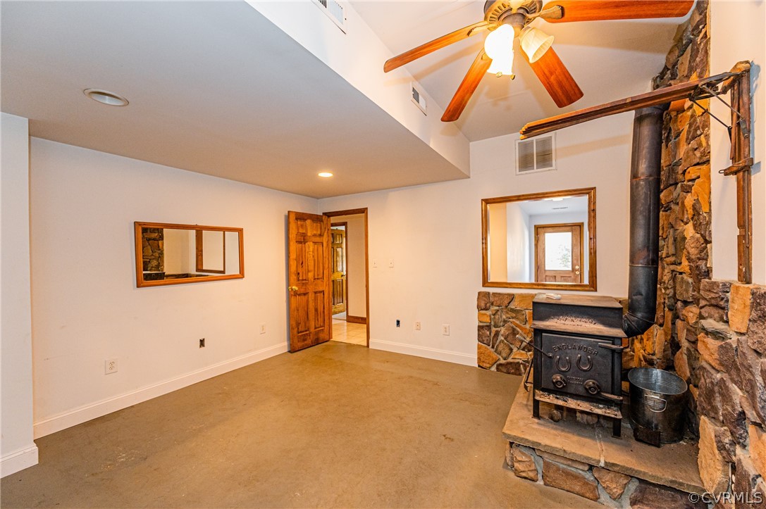 4612 Tatum Road Disputanta, VA 23842 - Photo 37 of 50 a view of a livingroom with furniture and staircase