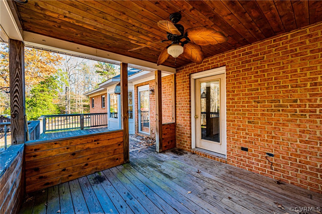 4612 Tatum Road Disputanta, VA 23842 - Photo 38 of 50 a view of a porch with wooden floor