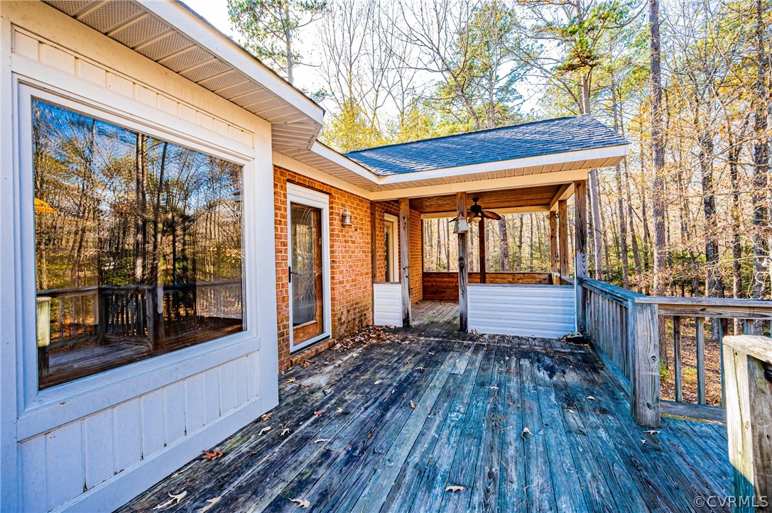 4612 Tatum Road Disputanta, VA 23842 - Photo 39 of 50 a view of a porch with wooden floor and outdoor space